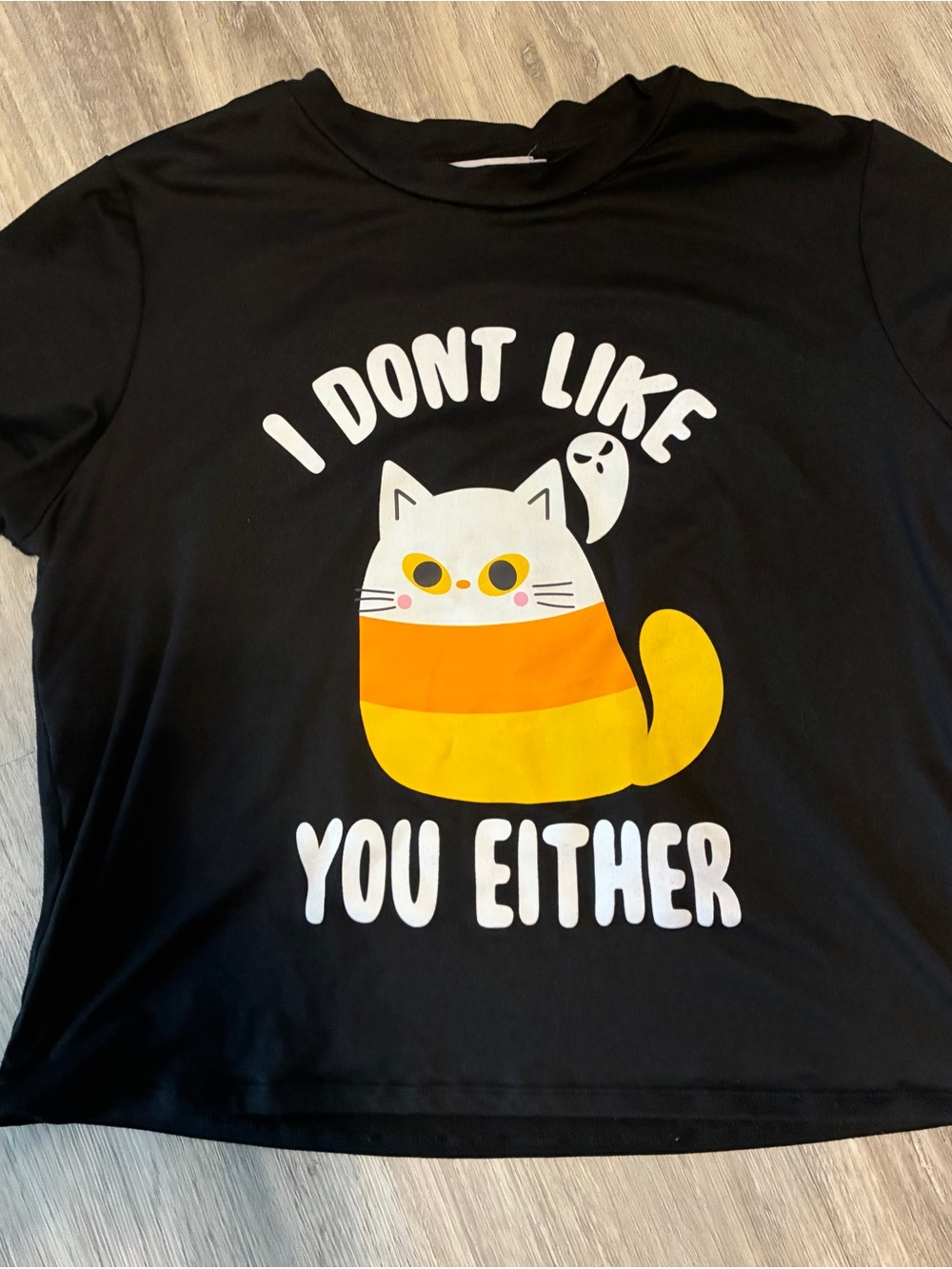 Women’s Black Graphic Tee with Yellow & Orange Cat Design